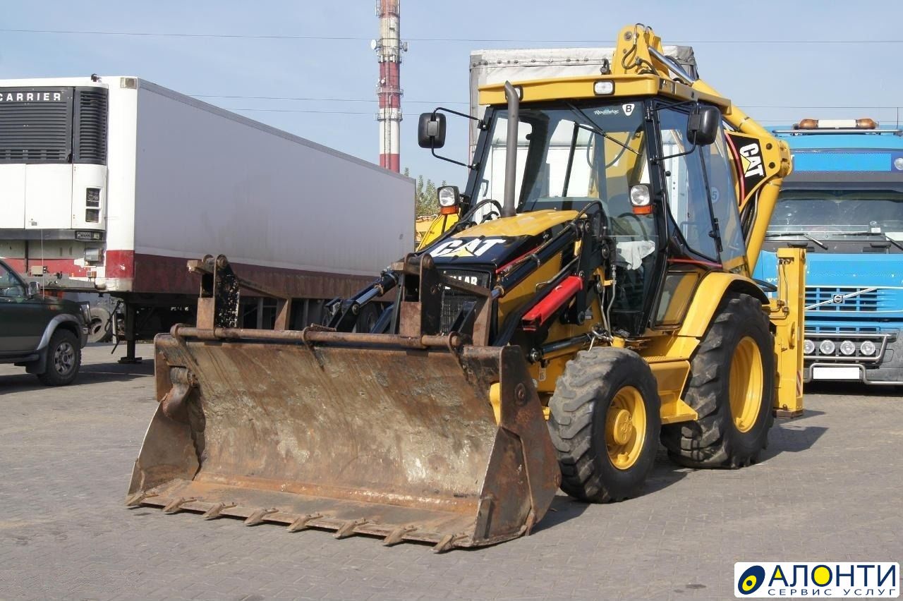 Бульдозер тверь. Катерпиллер 428 д. Caterpillar 428d. Caterpillar 428d II, 2005 Г. Бульдозер Тверь аренда.